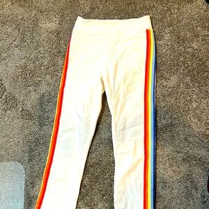 White yoga pants with rainbow side detail